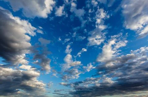 Colorful cloudy sky at sunset. Gradient color. Sky texture, abstract nature b Stock Photos