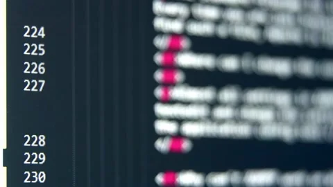 Colorful code being scrolled on computer screen. Coding in 5G era. Stock Footage 158370397