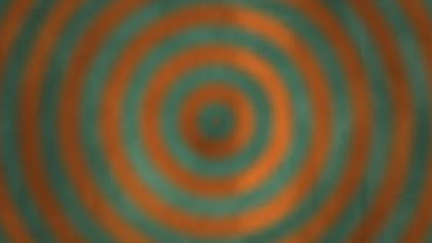 Colorful concentric circles create a dynamic pattern on a Stock Footage 338287266