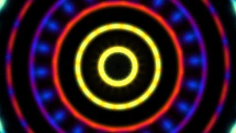 Colorful concentric circles with glowing effects on a dark Stock Footage 338014243