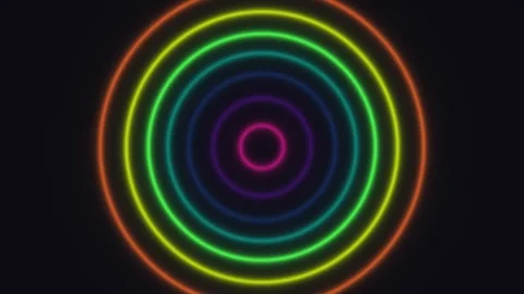 Colorful concentric circles light up a dark background Stock Footage 338226245