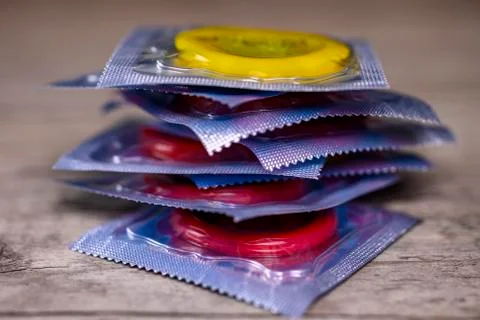 Colorful condoms stack Stock Photos