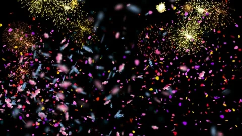 Colorful confetti and fireworks exploding in night sky Stock Footage 337602416