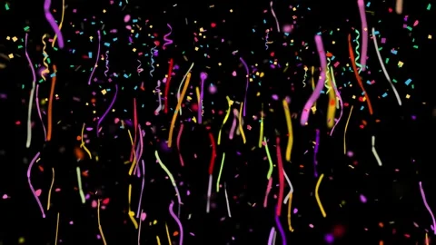 Colorful confetti explosion on black background for festive celebration and Stock Footage 345015876