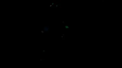 Colorful confetti falling on black background Stock Footage 340613447