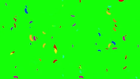 Colorful Confetti Falling Down Against A Bright Green Screen Background For Video stock 339166778