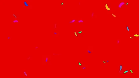 Colorful confetti falling on red background Stock Footage 337310603