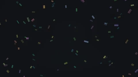 Colorful confetti falls in a dark space for celebratory Stock Footage 337968262