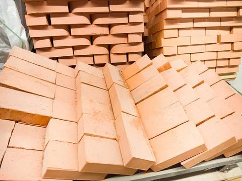 Colorful construction bricks stacked for future building projects Stockfoto's