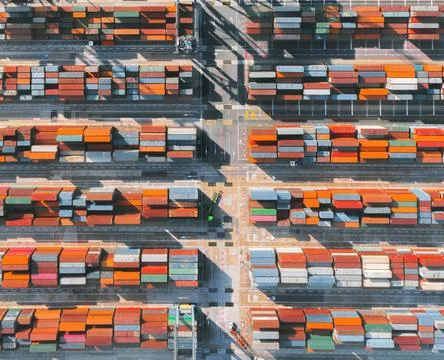 Colorful containers placed in rows Stock Photos