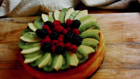 Colorful cracked cheesecake surface shown in close detail in wide view, 4K Stock Footage 341116183