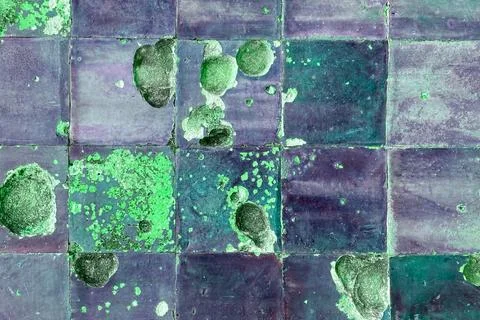 Colorful cracked tile texture, split tile, old vintage floor or wall background Stock Photos