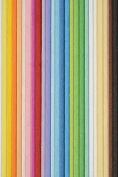 Colorful craft paper sheets stack edge texture background Stock Photos