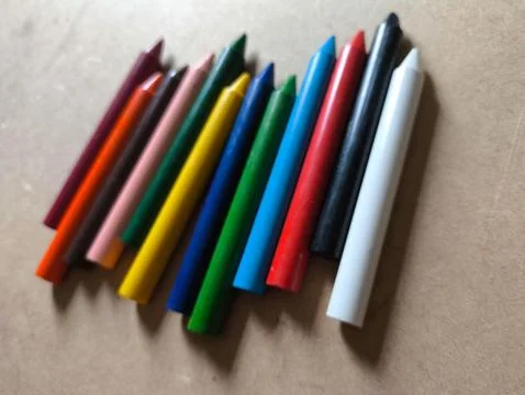 Colorful crayons on the table Stock Photos