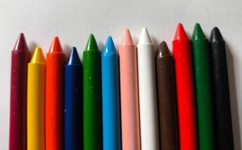 Colorful crayons on the table Stock Photos