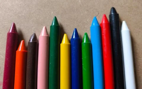 Colorful crayons on the table Stock Photos
