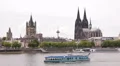 Colorful Cruise Ship Tour Boat Passing Rhine River Cologne Skyline Cityscape Day HD Footage