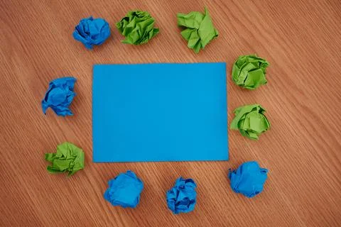 Colorful Crumpled Papers Circular Pattern Surrounding Heart Shaped Card. Blank 写真素材