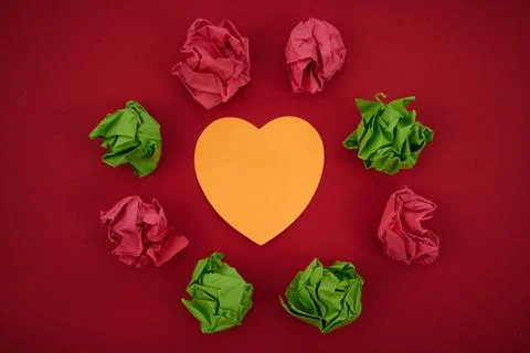 Colorful Crumpled Papers Circular Pattern Surrounding Heart Shaped Card. Blank 写真素材