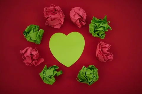 Colorful Crumpled Papers Circular Pattern Surrounding Heart Shaped Card. Blank 写真素材