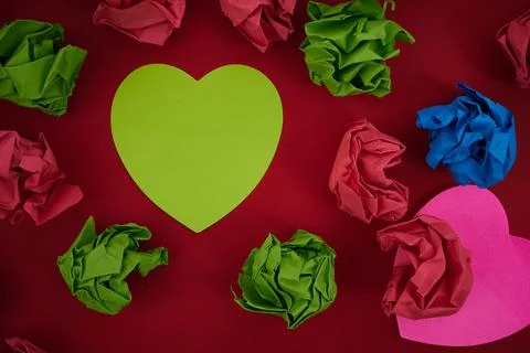 Colorful Crumpled Papers Circular Pattern Surrounding Heart Shaped Card. Blank 写真素材