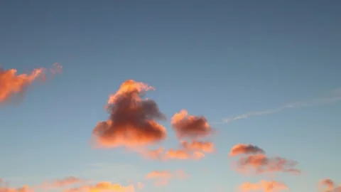 Colorful cumulus clouds at sunset Stock Footage 220186230