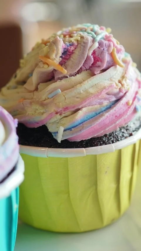 Colorful cupcake on a table in a cafe Stock Footage 340373874