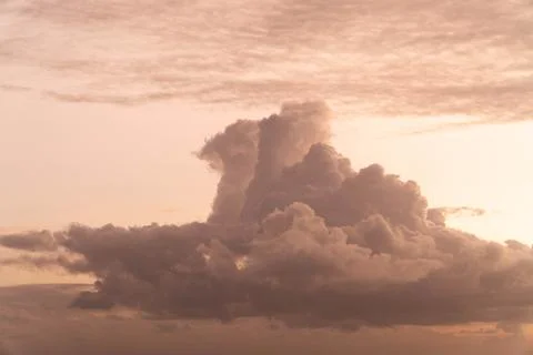 Colorful Dawn Cloud Formations At The Beach Stock Photos