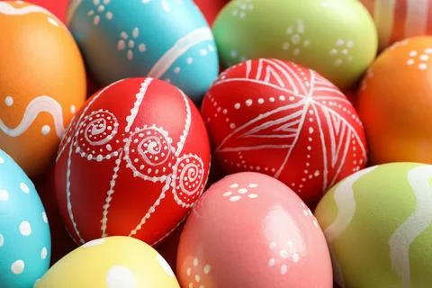 Colorful decorated Easter eggs as background, closeup Foto stock