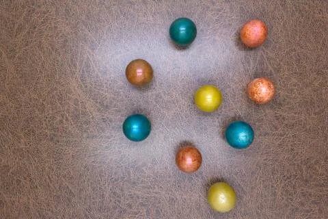 Colorful decorative and plain easter eggs arranged in random circular pattern Stock Photos
