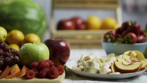 Colorful, delicious looking fruit on kitchen counter - tracking shot Stock Footage 341199311