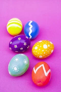 Colorful Designed Easter Eggs Arranged Neatly On Light Pink Background Stock Photos
