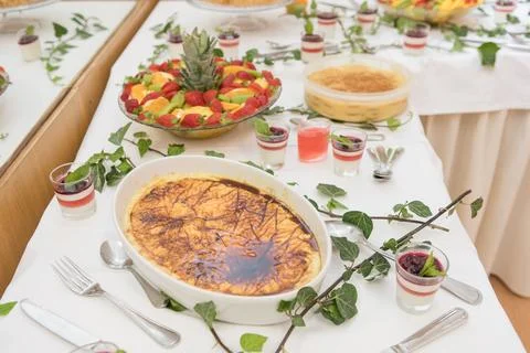 Colorful dessert table with assorted fruit platter Stock Photos