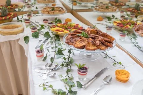 Colorful dessert table with assorted fruit platter Stock Photos