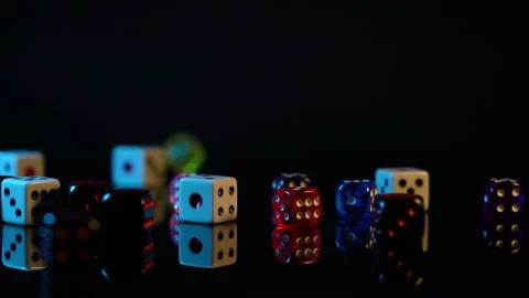 Colorful dice on black background slow motion 動画素材 213955971