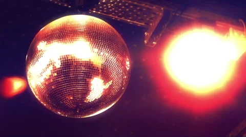 Colorful Disco mirror ball ceiling lighs at 70's disco Video stock 44920429