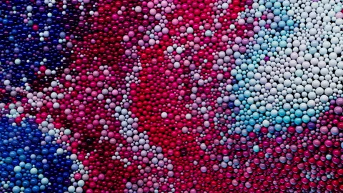 Colorful divorces. 3D abstraction consisting of multicolored spheres move in  Stock Footage 224670653
