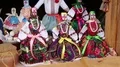 Colorful dolls of Ukrainian women in traditional clothes in souvenir shop HD Footage