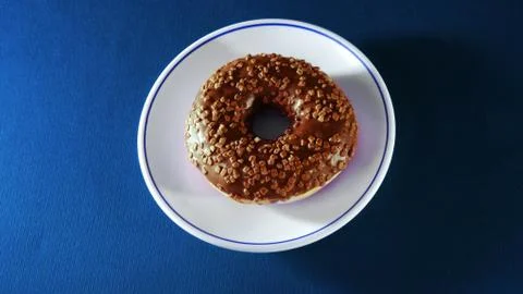 Colorful donuts on stone table.  Stock Photos