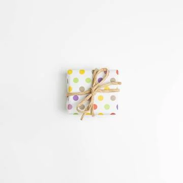 Colorful dot pattern gift box isolated on white background. top view, copy... Stock Photos