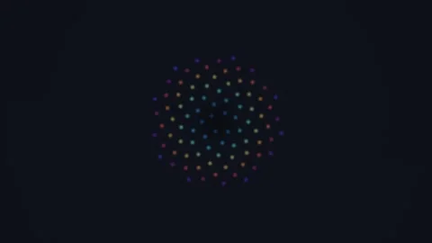Colorful dots create a pattern on a dark background Stock Footage 337952460