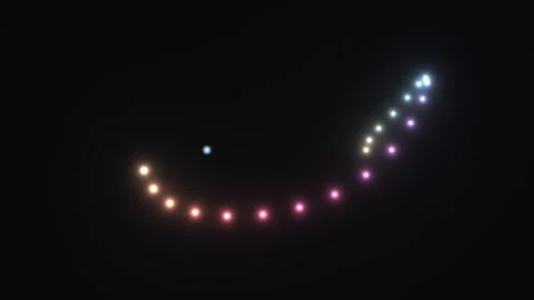 Colorful dots forming a curve in dark space Stock Footage 338323320