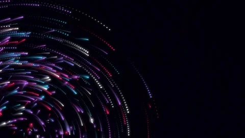 Colorful dotted light trails in pink, blue, purple, and white flowing in dy.. Stock Footage 342723446