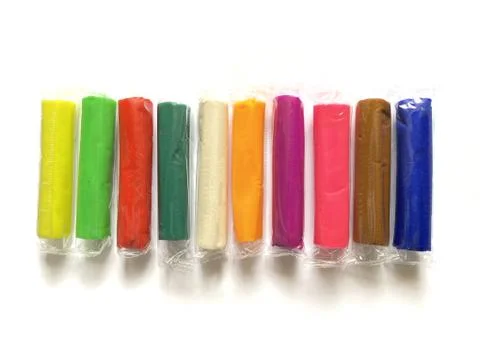 Colorful dough for modeling isolated on a white background. Educational toys Stock Photos