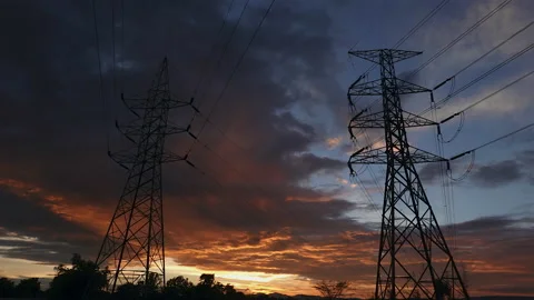 Colorful dramatic sky and Silhouette of high voltage electrical pole structure Stock Footage 155505280