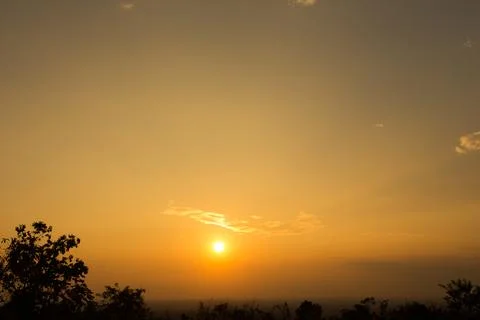 Colorful dramatic sky with cloud at Sunrise.Sky with sun background Stock Photos