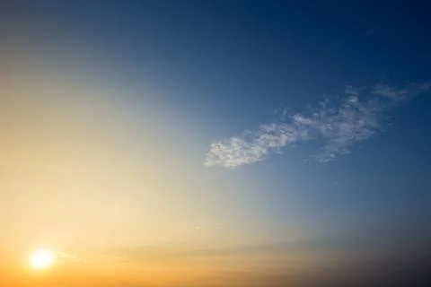 Colorful dramatic sky with cloud at Sunrise.Sky with sun background Stock Photos