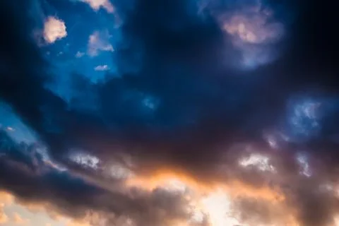 Colorful dramatic sky with cloud at sunset Stock Photos