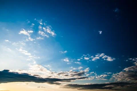 Colorful dramatic sky with cloud at sunset Stock Photos