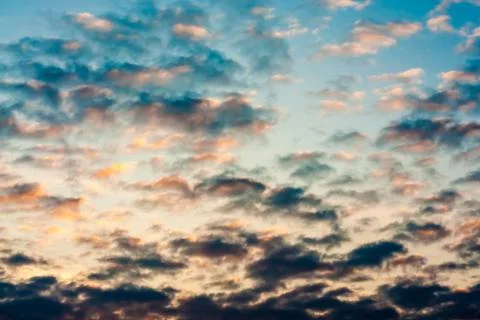 Colorful dramatic sky with cloud at sunset Stock Photos